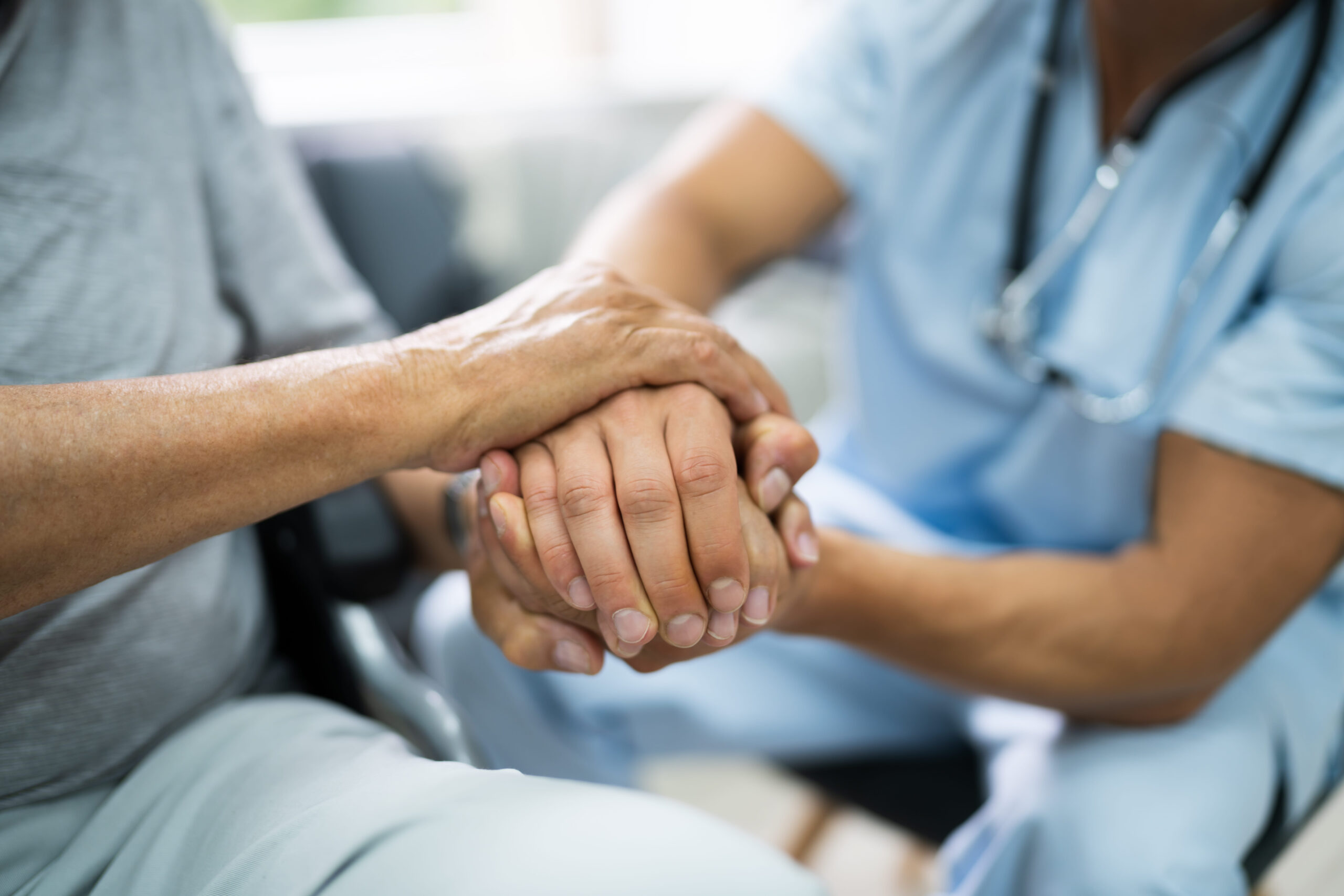 Elder Patient Helping Nurse Hand And Care